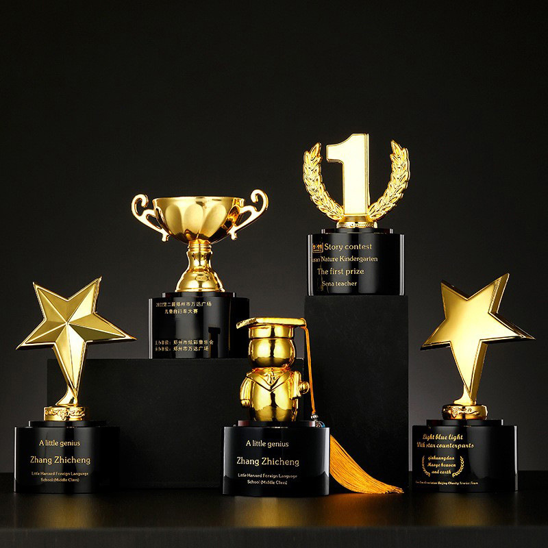 Children's gold, silver and bronze metal trophies