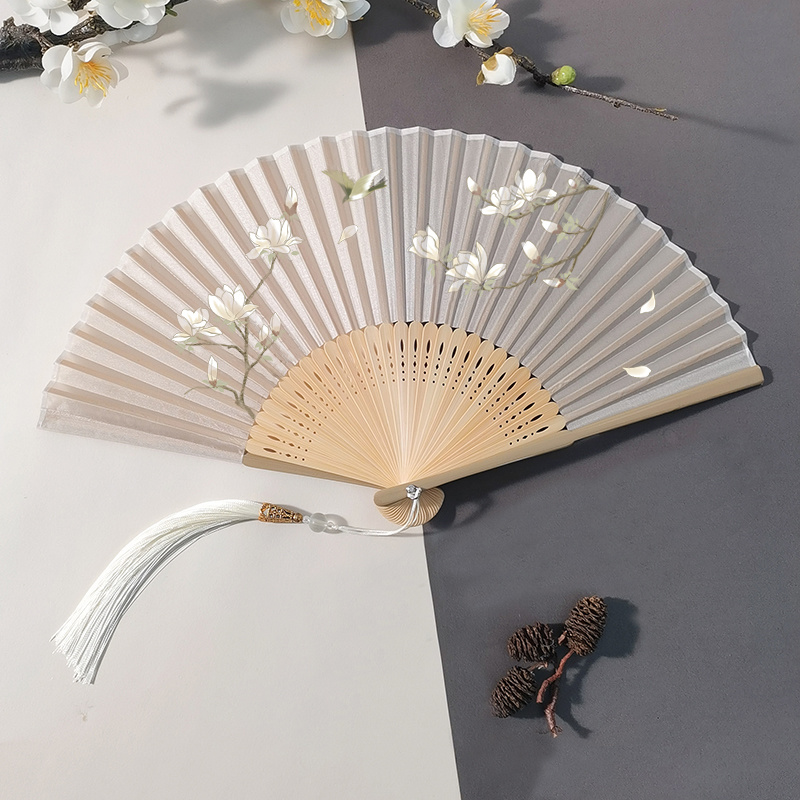 Antique style pattern folding fan