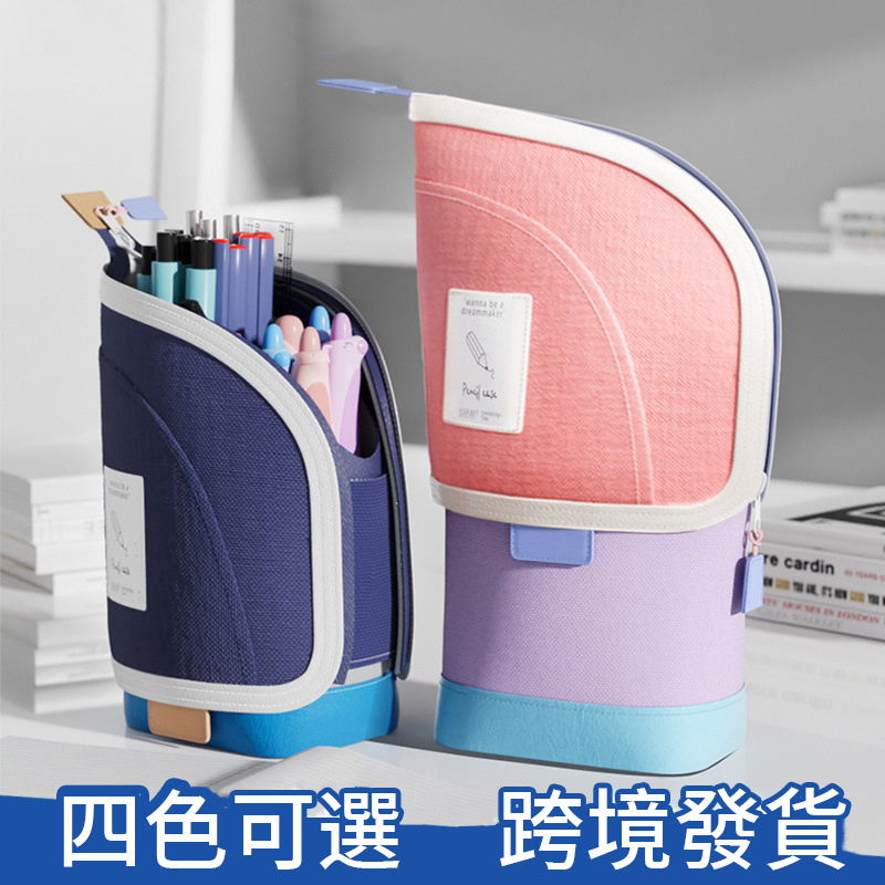 Extensible standing pen holder