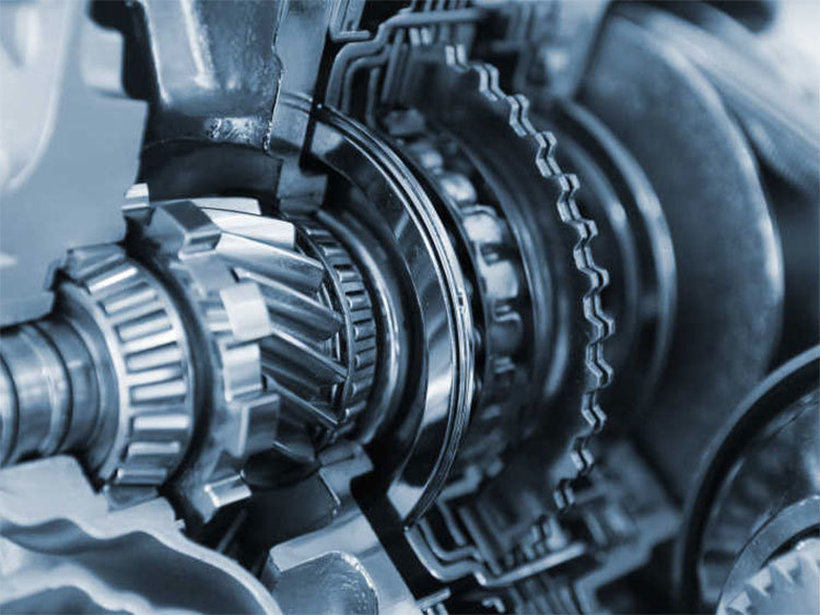 Why are the teeth on car transmission gears slanted?