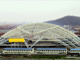 The first large open-closed stadium