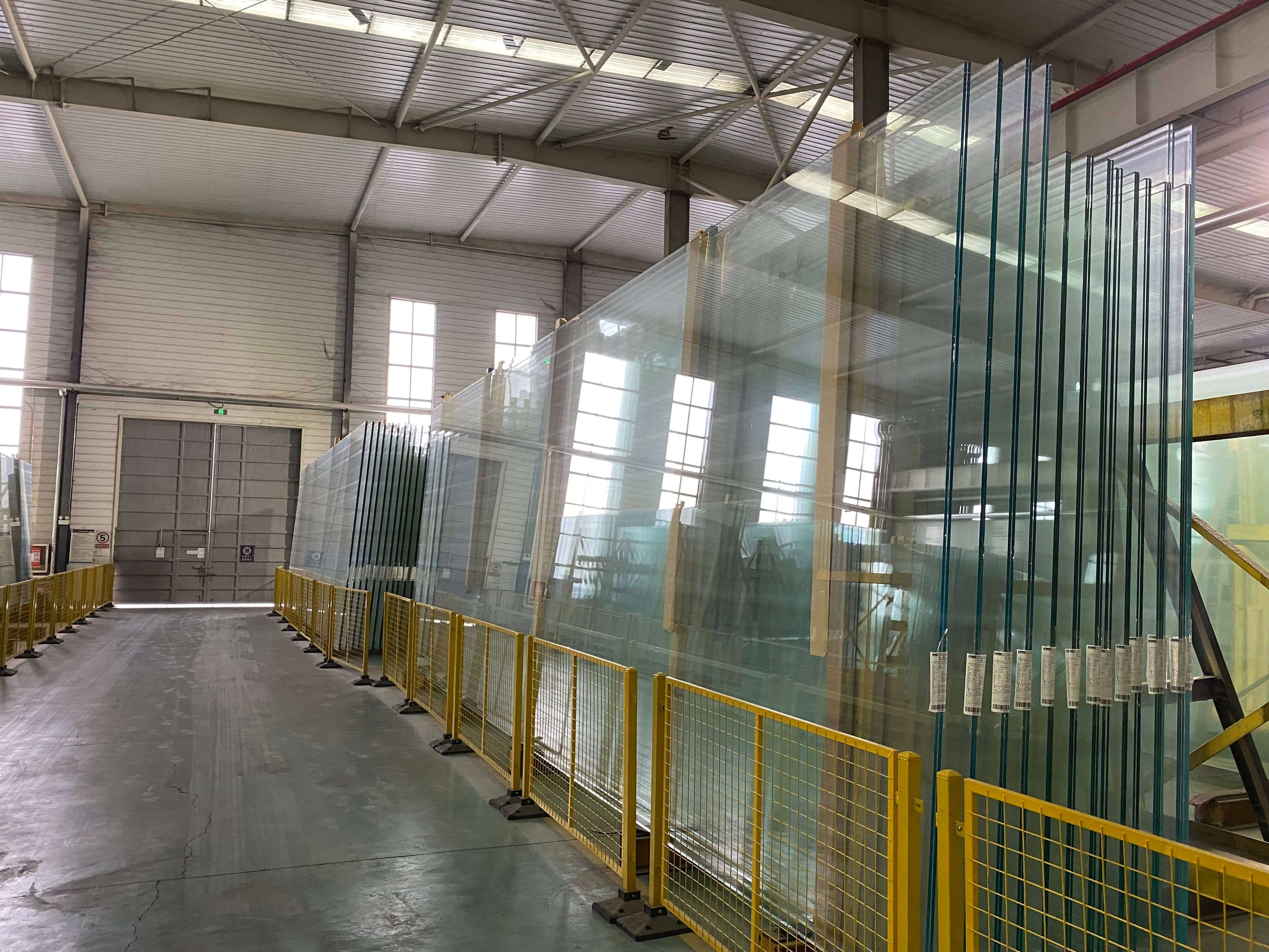 stacks of glass panels warehouse
