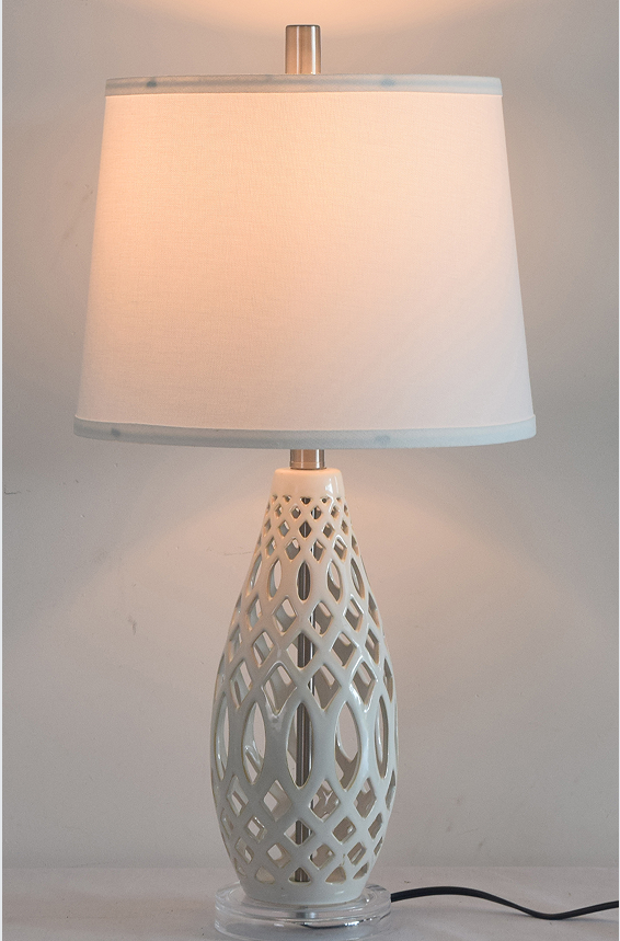 White openwork ceramic table lamp