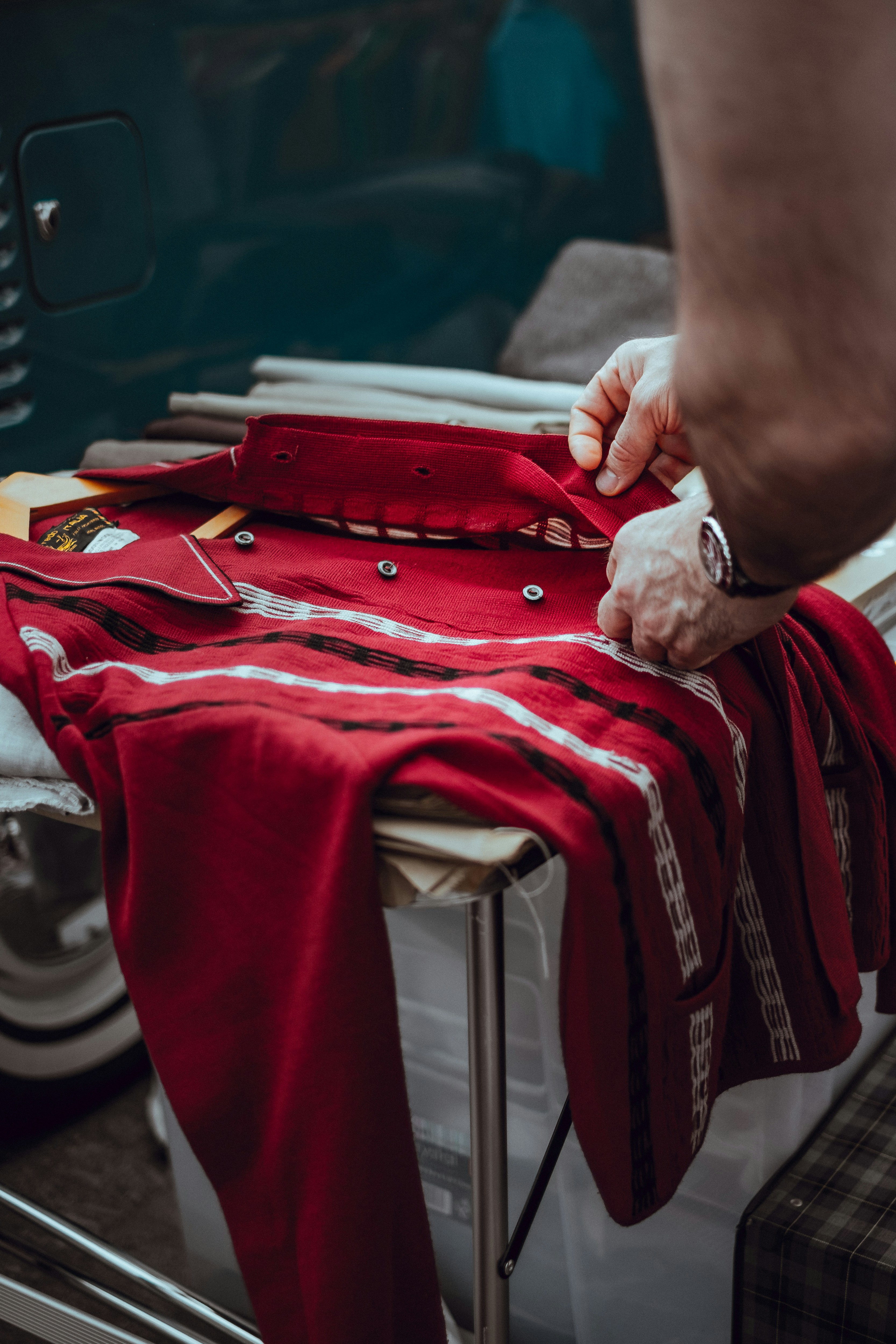 Collection of vintage rugby union shirts with team logos and event details