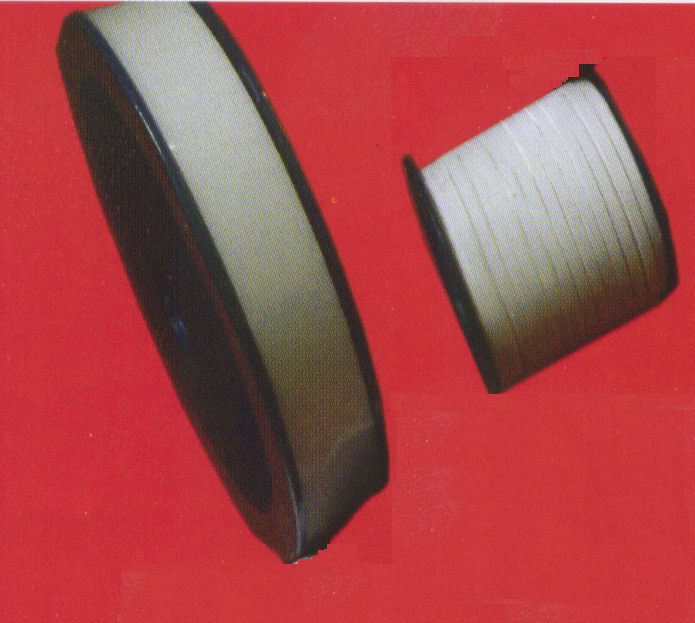 Self-adhesive expanded PTFE packing