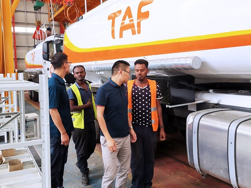 Eritrean customer conducts on-site vehicle inspection, delivers the vehicle, and delivers the vehicle