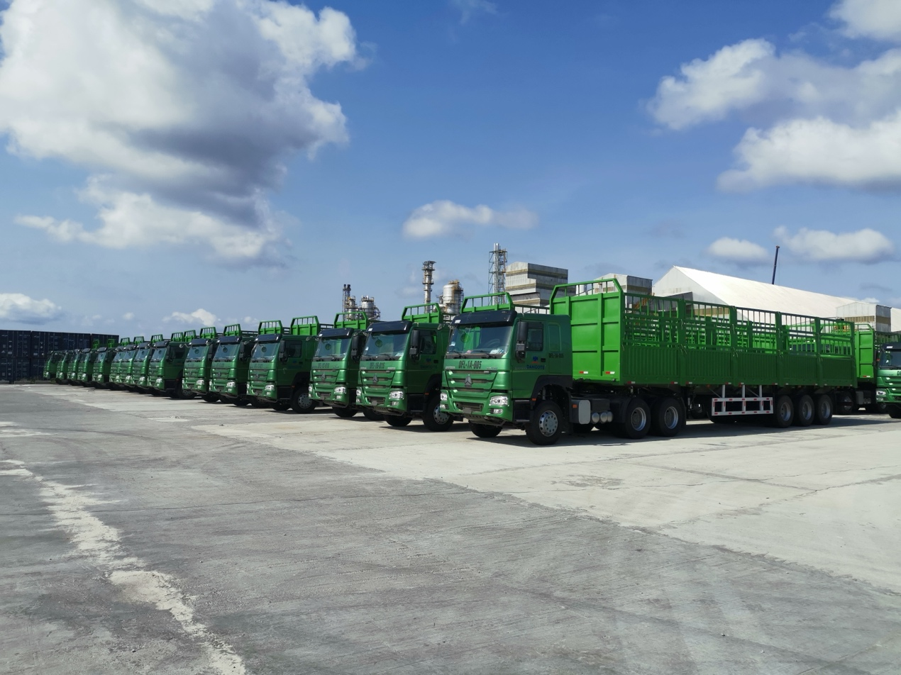 A group photo of the local transport company launching a new vehicle