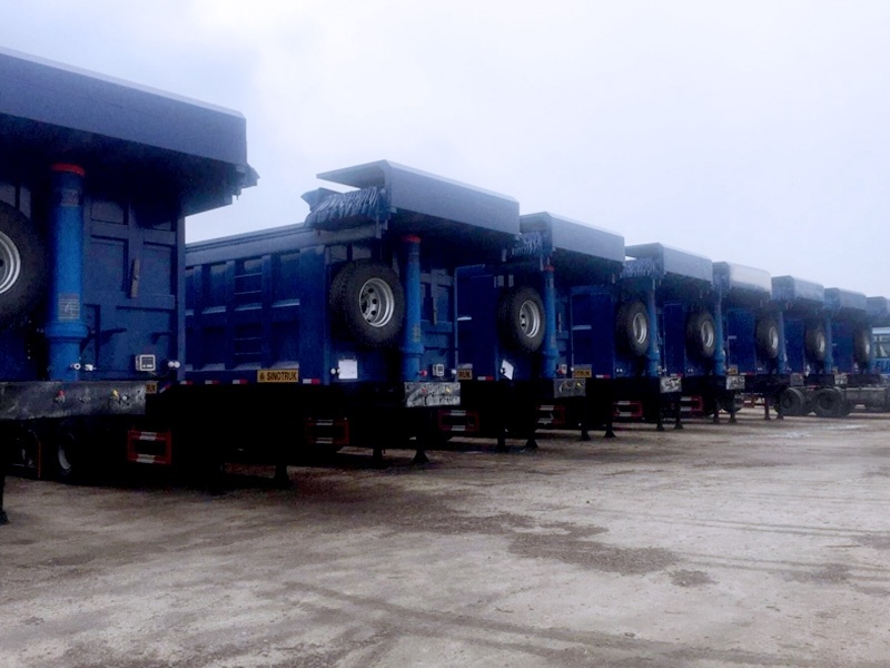 China National Heavy Duty Truck Group has specially designed grain transportation dump semi trailers for local grain companies based on their requirements - with good sealing and high load-bearing capacity