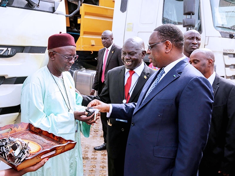 President of Senegal Macky Sall attended SINOTRUK delivery ceremony of upgraded trucks and handed th...
