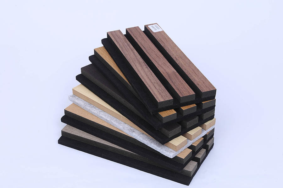 What is the main function of sound-absorbing materials?