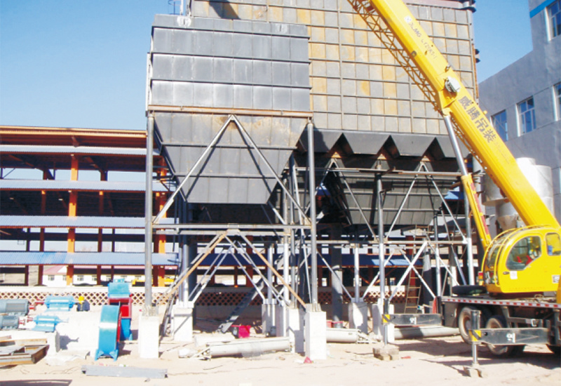 Furnace front exhaust and annular feeder dust collector