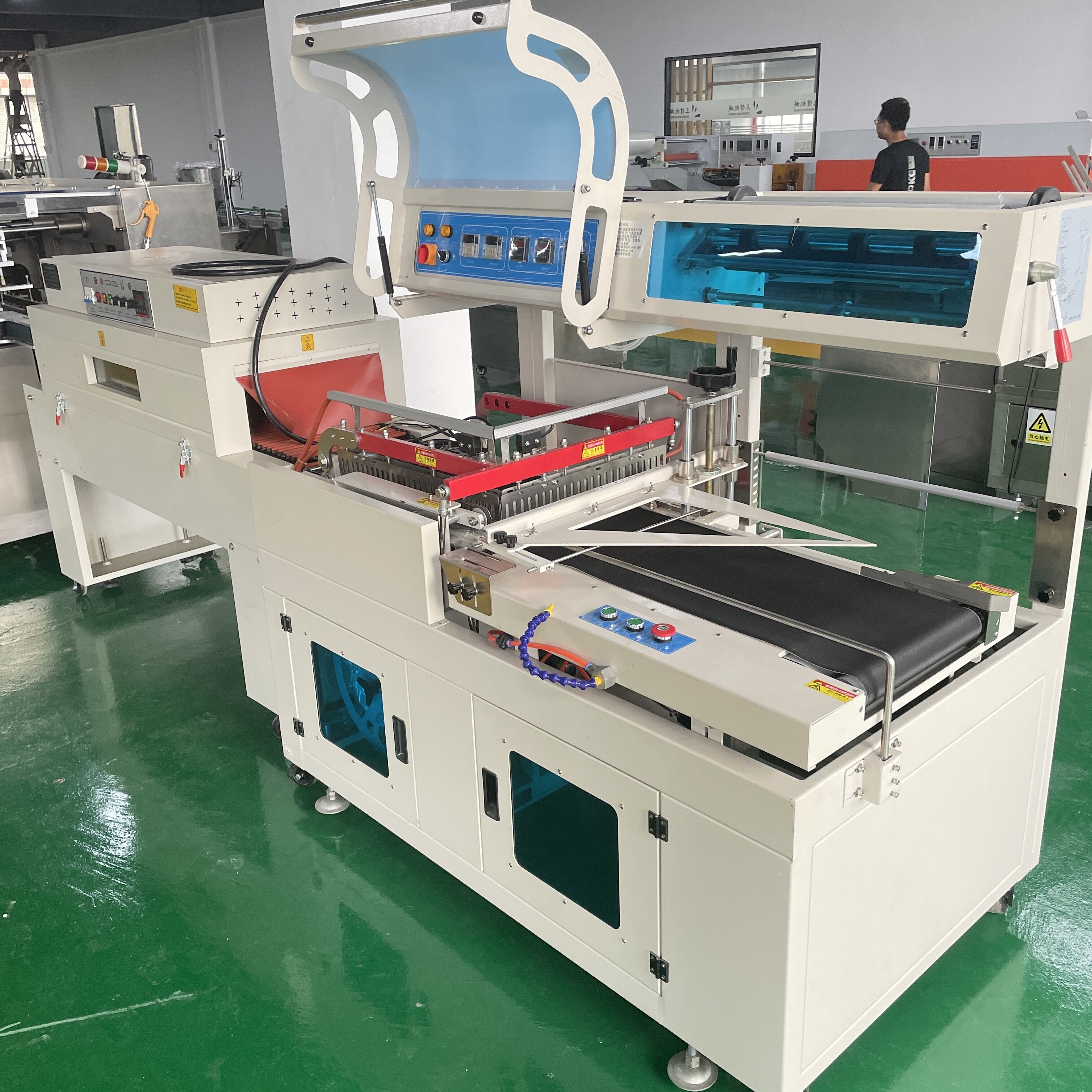 Hot Selling Fully Automatic L-Type Heat and Shrinkable Cosmetic Packaging Machine