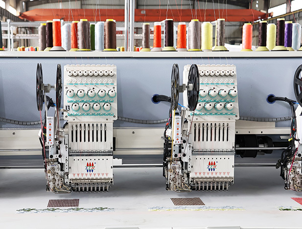 What are the impacts of embroidery machinery on the environment?