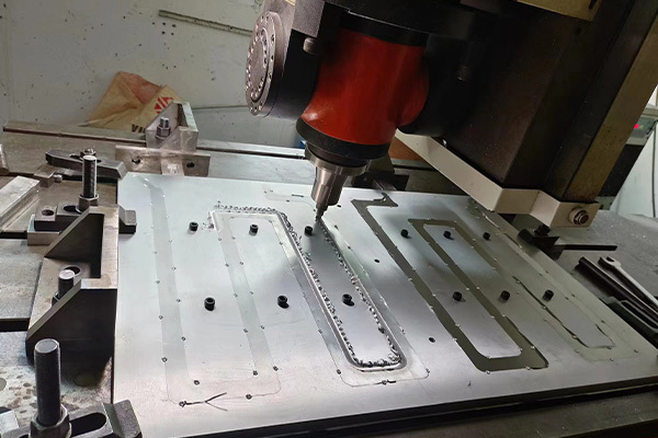 Friction stir welding (FSW) process is used for liquid cooling plates in battery cooling systems