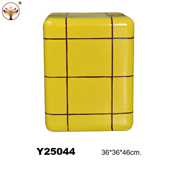 small yellow square stool