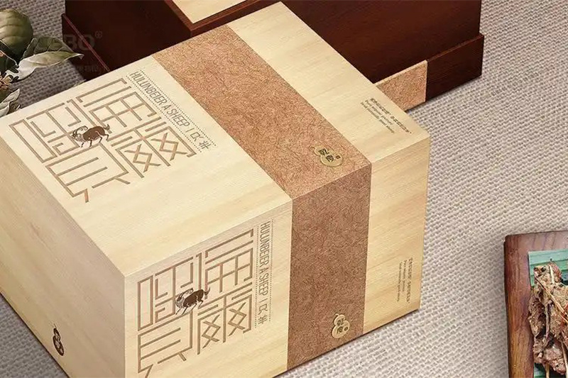 What is the purpose of the film on the outside of the cardboard box?