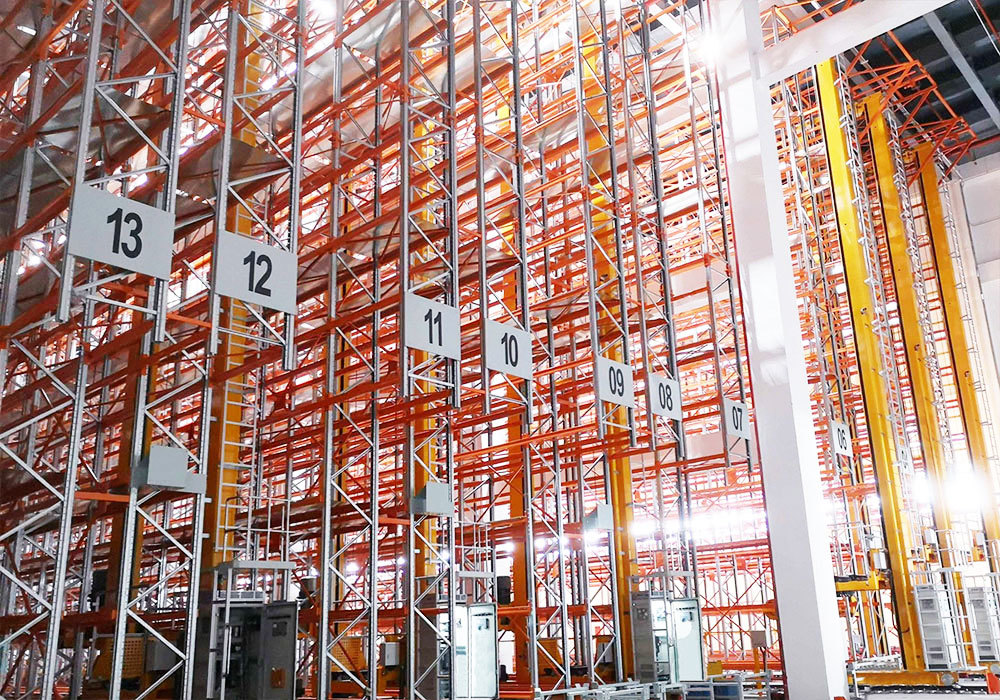Système automatisé de stockage et de récupération par pont roulant