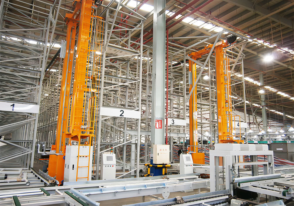 Système automatisé de stockage et de récupération par pont roulant