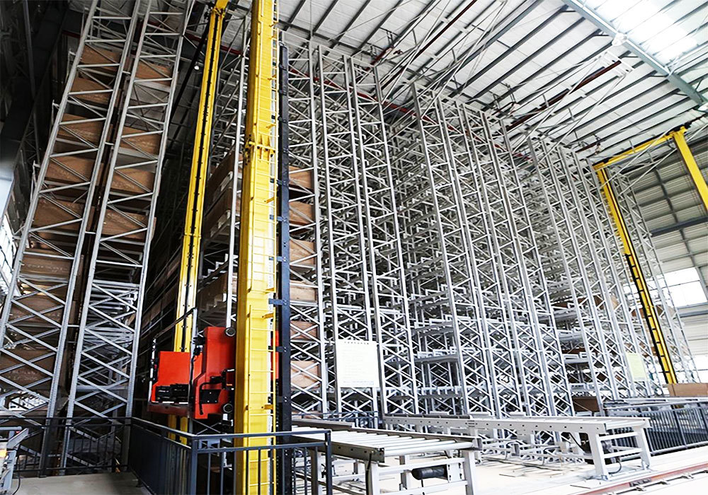Système automatisé de stockage et de récupération par pont roulant