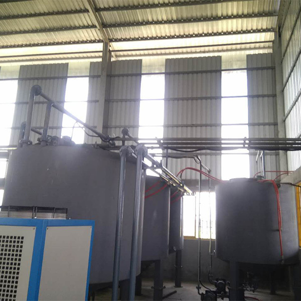 What is the function of the frequency converter in a sponge foaming machine?
