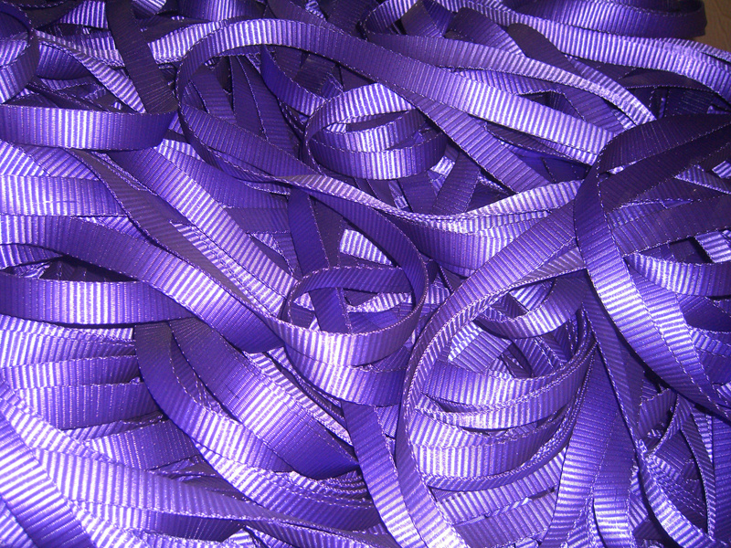 Synthetic fiber webbing