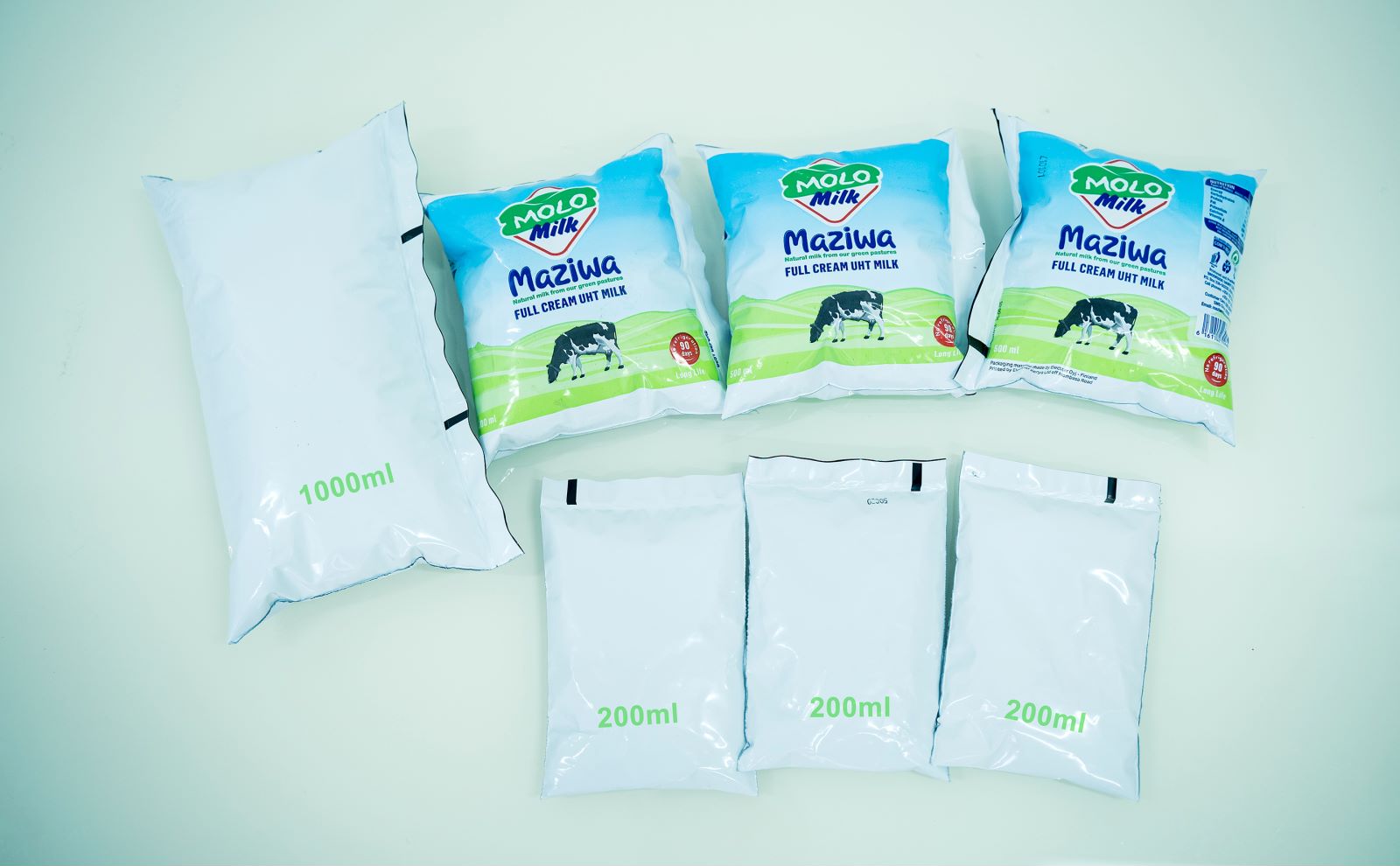 Durable milk processing and packaging machine