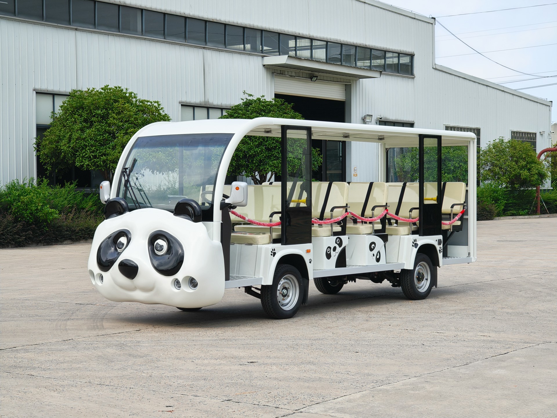 14 open-top white panda-shaped vehicles