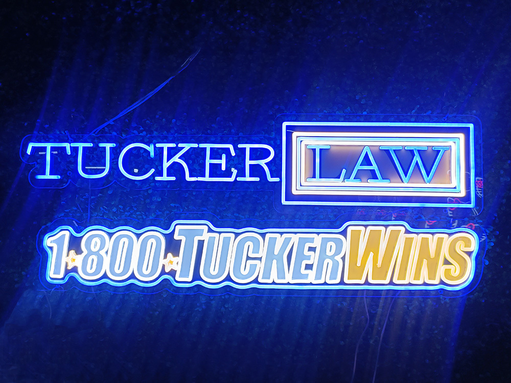 Tucker law neon sign