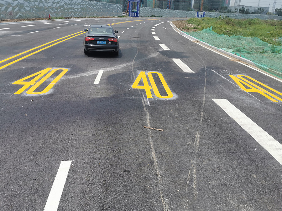 Road speed limit marking hot melt line completion site