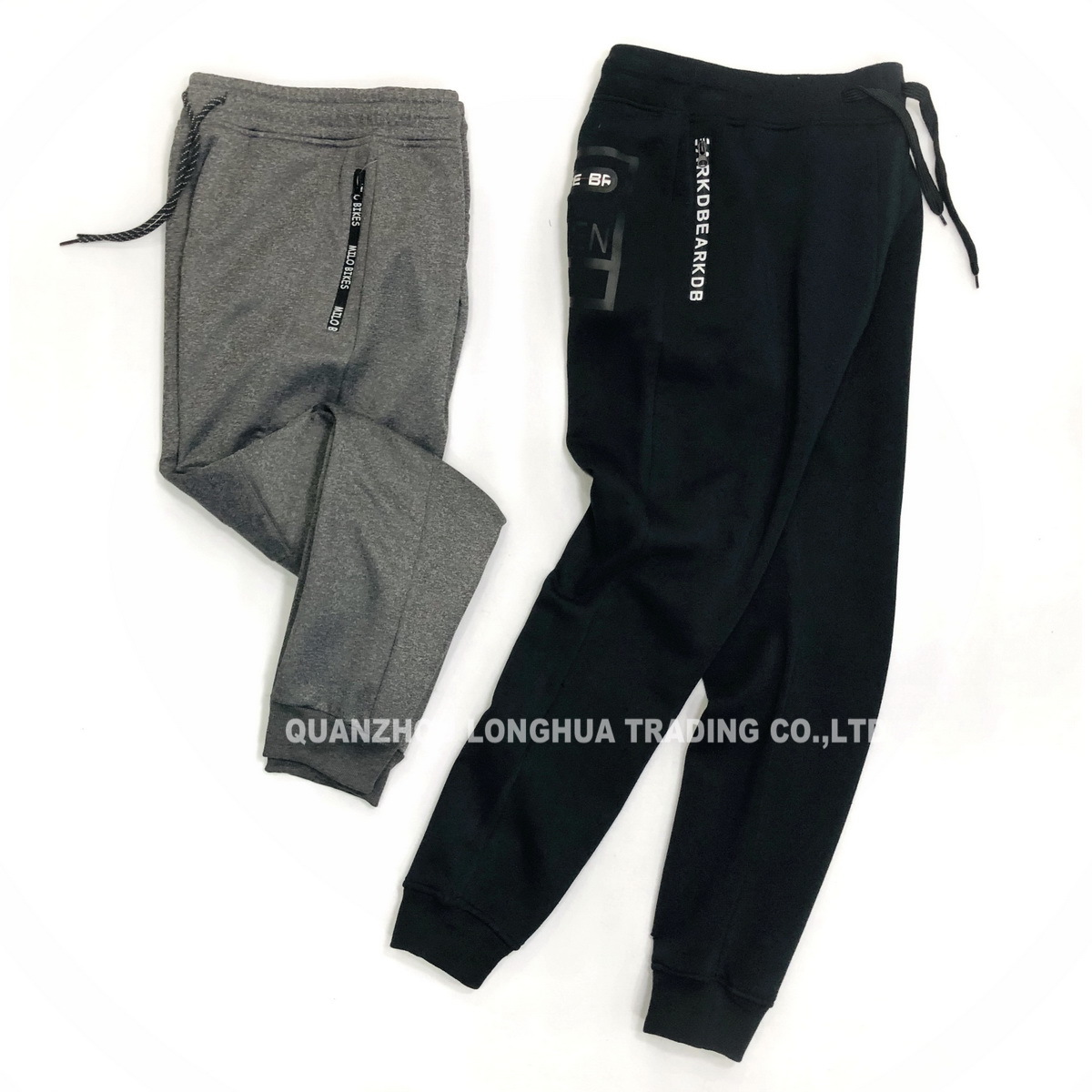 Men′s and Boy′s Joggers Casual Knitwear Jogging Pants Apparel Trousers Kids Wear Polyester Fleece Joggers Interlock with Print Zipper Tape