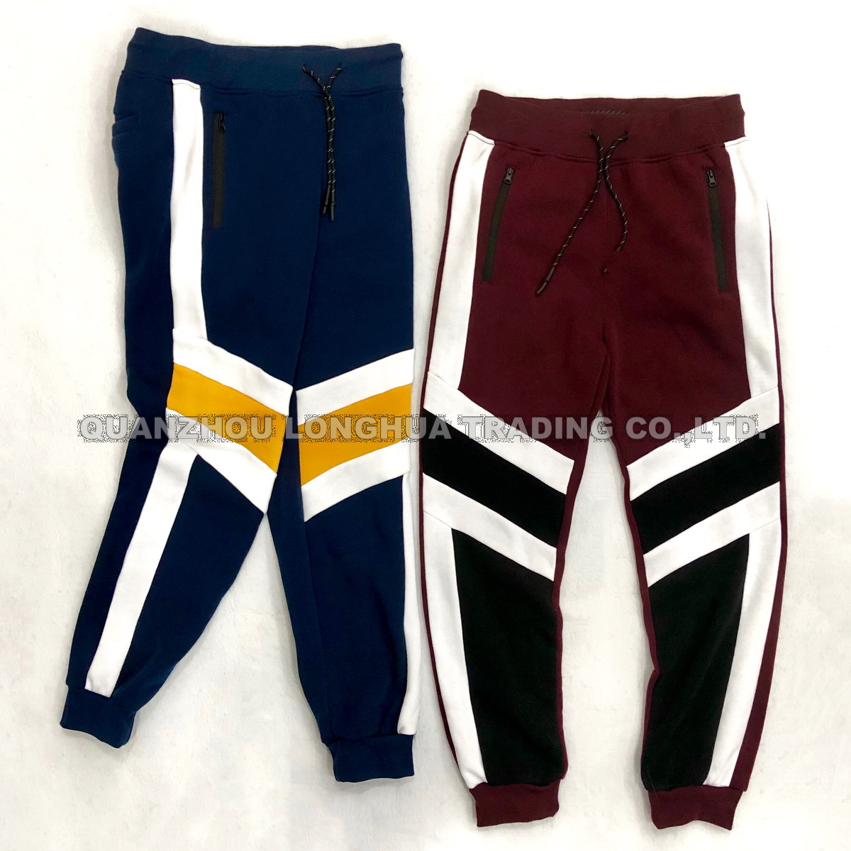 Men′s and Boy′s Joggers Knitwear Casual Jogging Pants Trousers Apparel Kids Wear with Contrast Color Joint Panel Polyester Fleece Joggers
