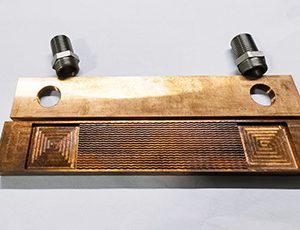 Precision metal sheet processing for microchannel fabrication