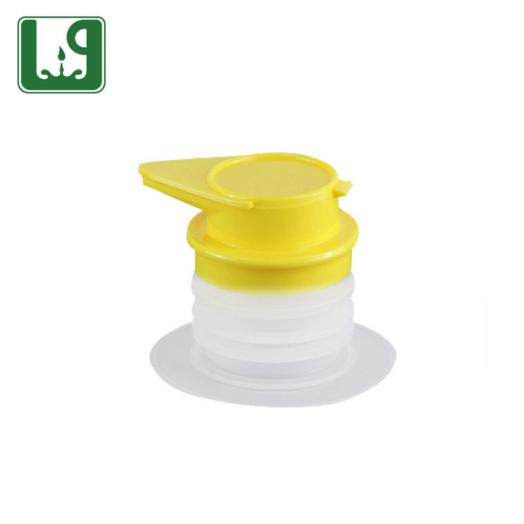 Yellow pouring oil spout spray pump BIB valve