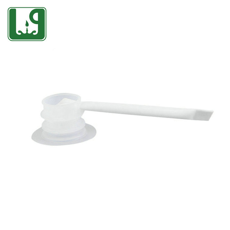 Non spill plastic valve with tube for milk bag