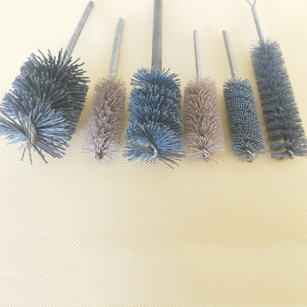 Abrasive nylon tube cleaning brush