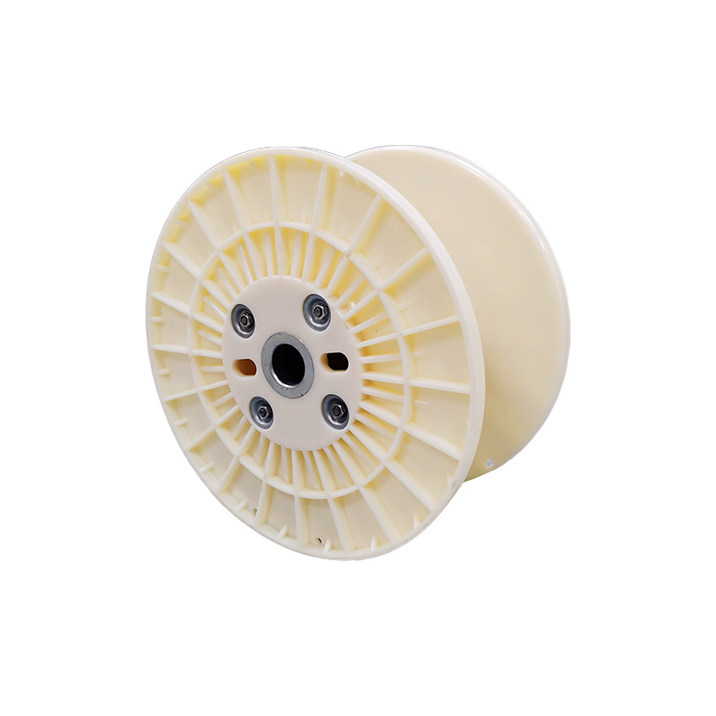 Plastic spool for process turnover spool