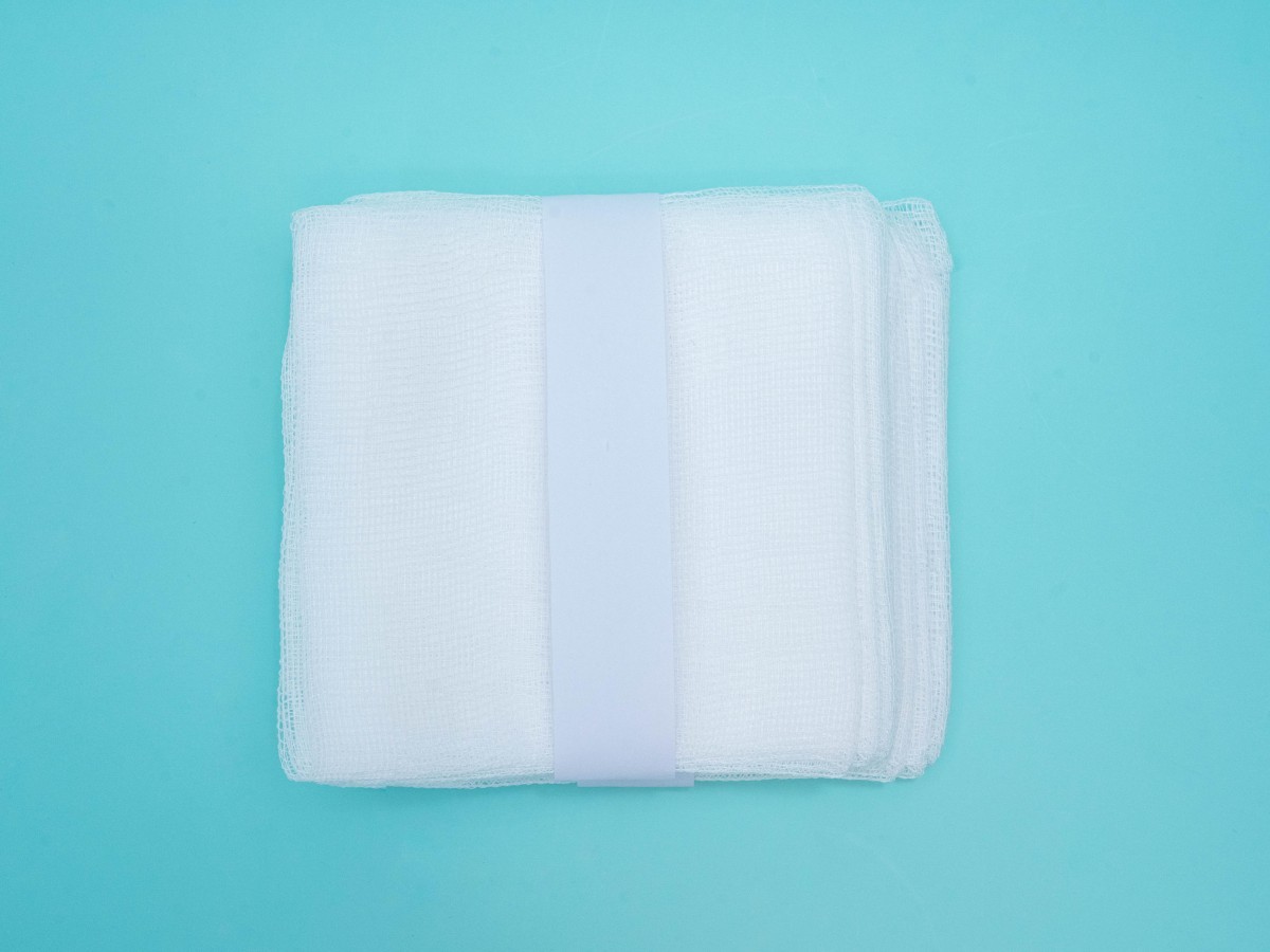 Paper bag wrapped with developing gauze sheet
