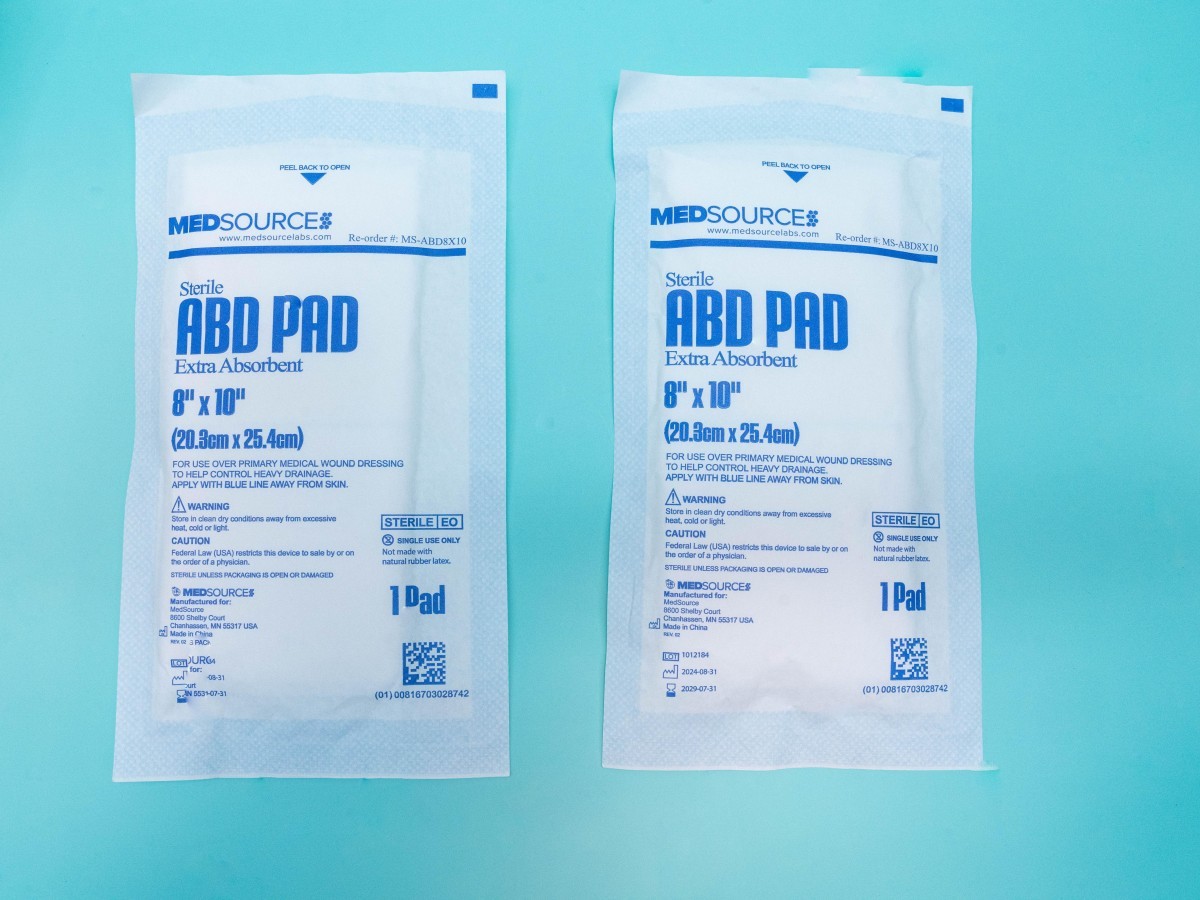 Four sided sealed abd pad
