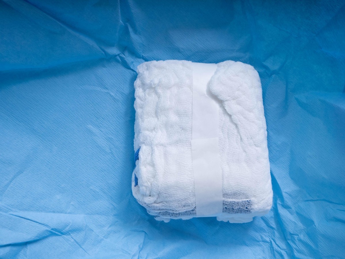 Wrinkle paper vacuum formed abdominal pad