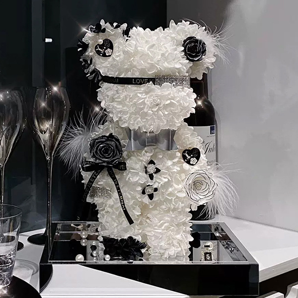 Bear made of preserved white hydrangea and preserved roses