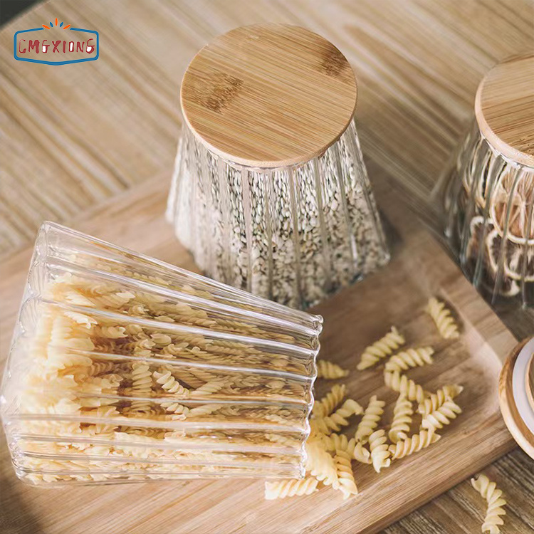 Custom-made transparent, hand-blown, heat-resistant petal-shaped glass storage jar with lid, perfect for grains and dried fruits.