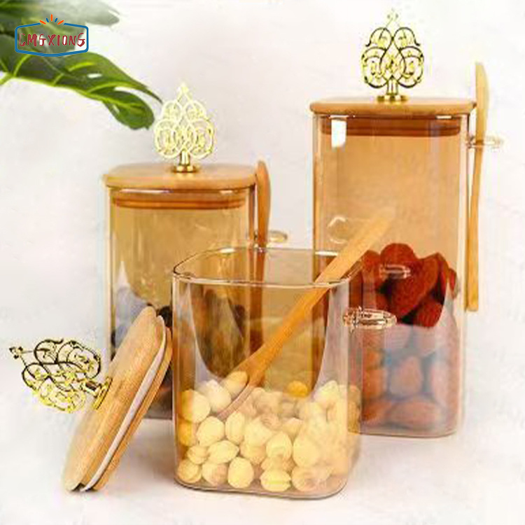 Wholesale factory storage jars and containers—clear, empty glass with reusable lids and spoons, perfect for household use.