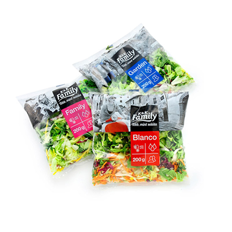 Salads are packaged on an automatic weighing and quantitative packaging machine