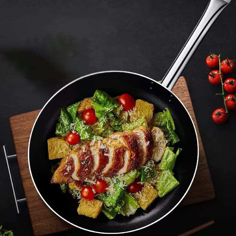 Non-stick pan with steel handle