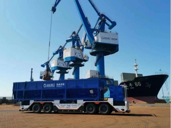 Guotang first unmanned container transport vehicle for dry bulk cargo on trial operation in Weifang Port Guotang first unmanned container transport vehicle for dry bulk cargo on trial operation in Weifang Port