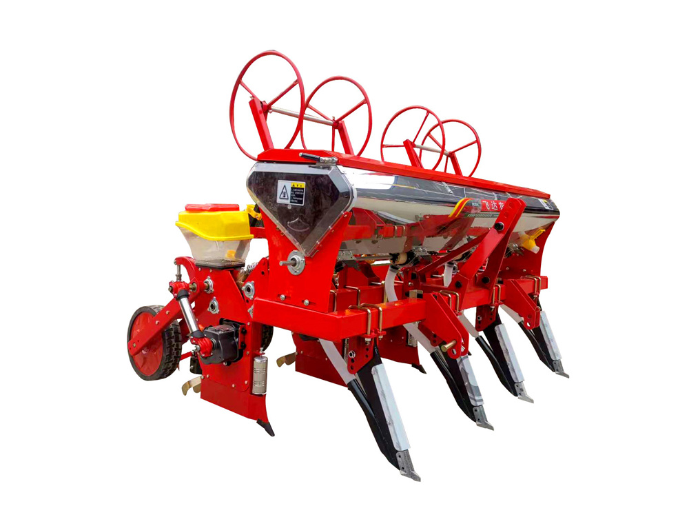 Four-row corn planter with angled drip irrigation tape