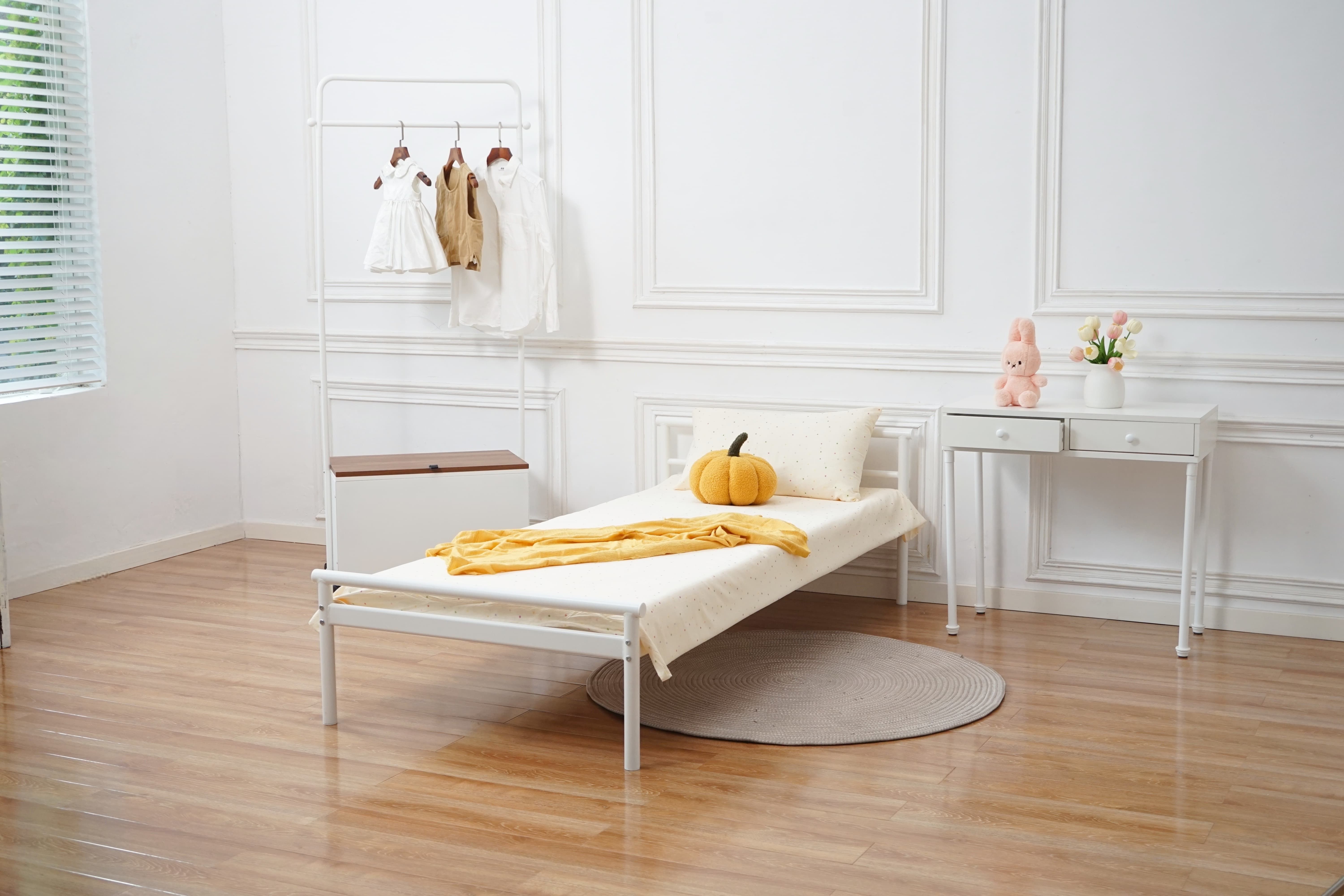 Cama de hierro con tubo redondo