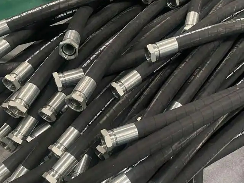 What should I do if the high-pressure rubber hose is damaged