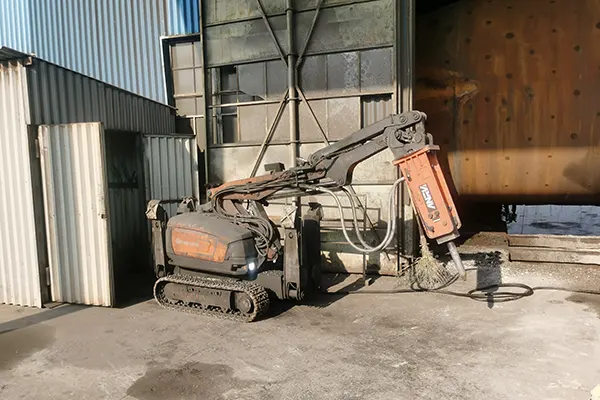 Hydraulic Hammer Assists Cement Kiln Industry Production - Baosteel Torpedo Tank Demolition