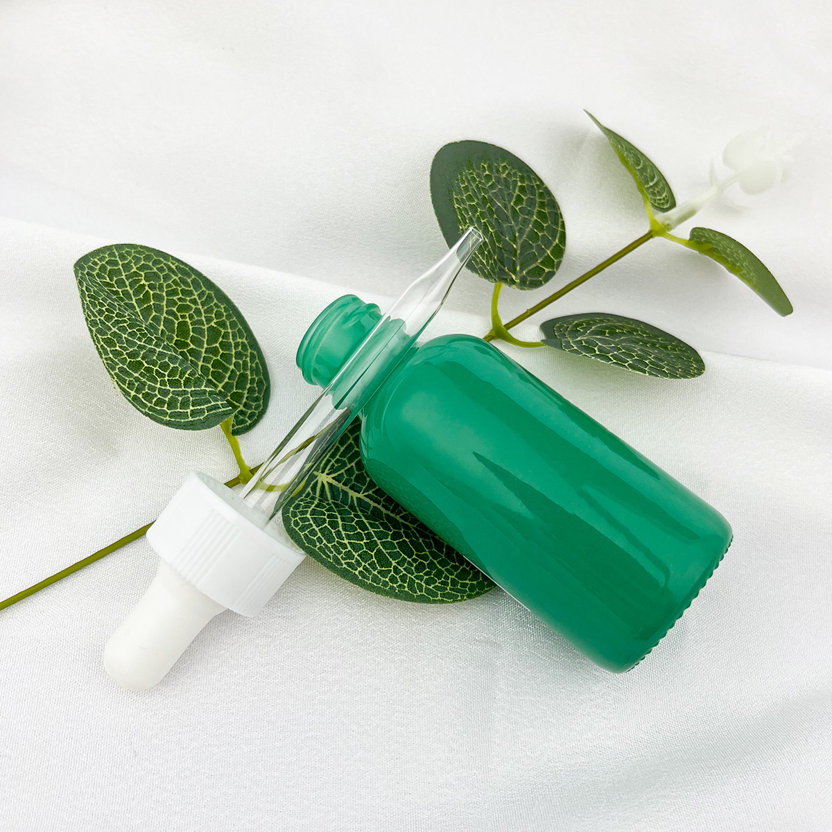 Dropper glass bottle